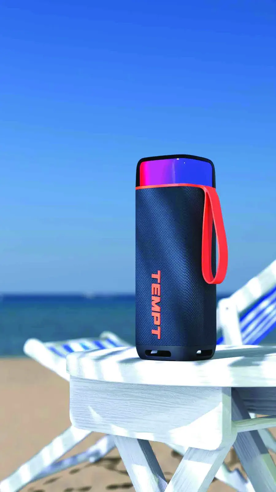 Portable Tempt Bluetooth speaker by a pool